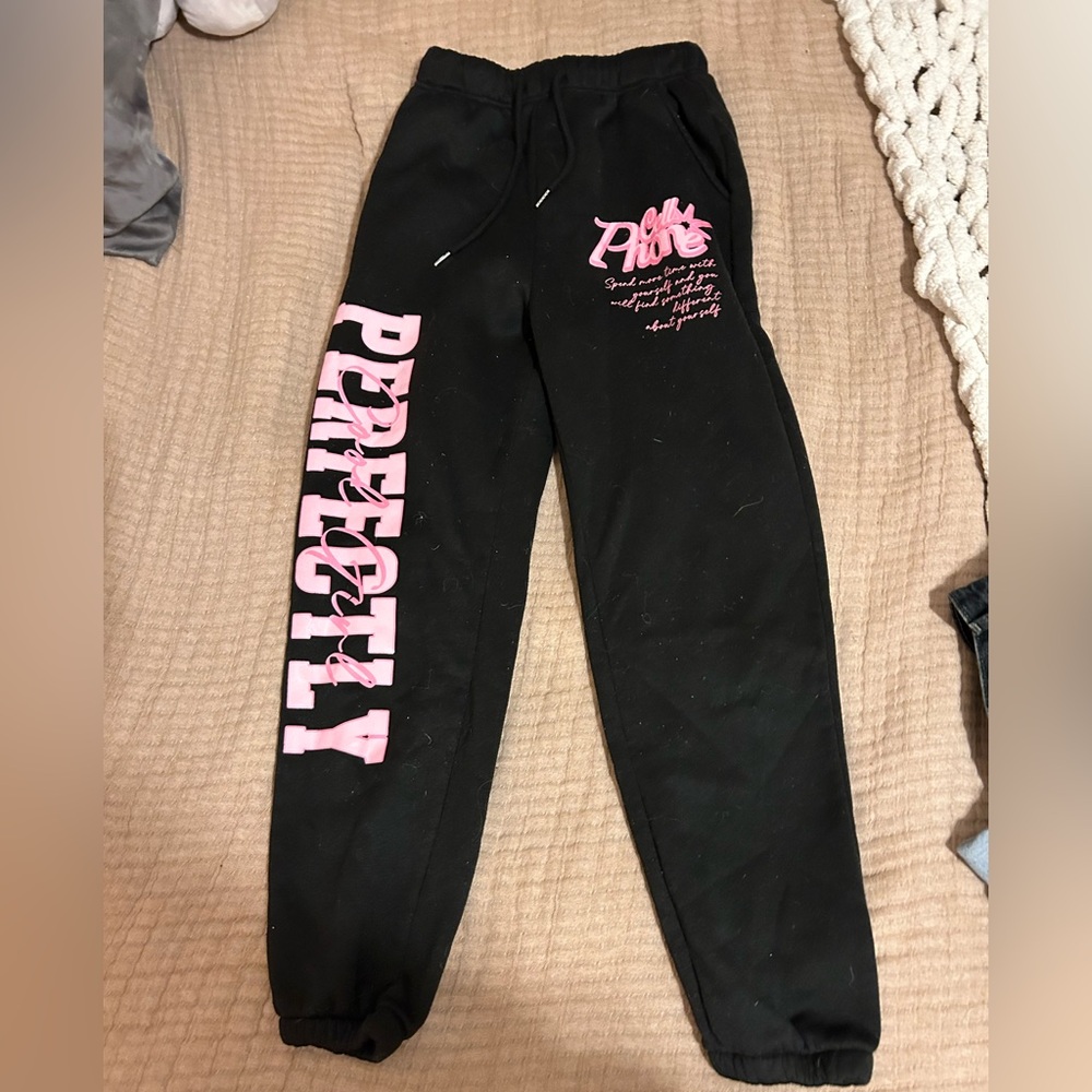 Black sweatpants with pink print size medium